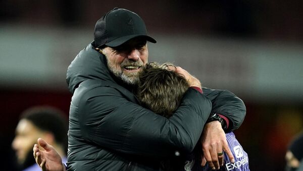 Liverpool manager Jurgen Klopp and Conor Bradley celebrate. Photo credit: Andrew Matthews/PA Wire.