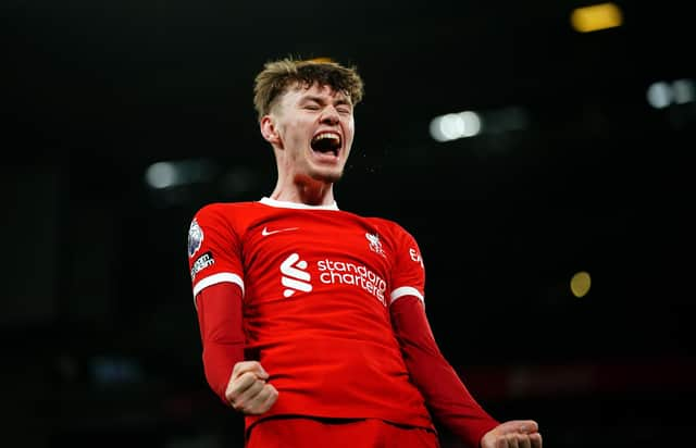 Liverpool's Conor Bradley celebrates after assisting their side's third goal of the game scored by Dominik Szoboszlai during the Premier League match at Anfield, Liverpool. PIC: Peter Byrne/PA Wire.