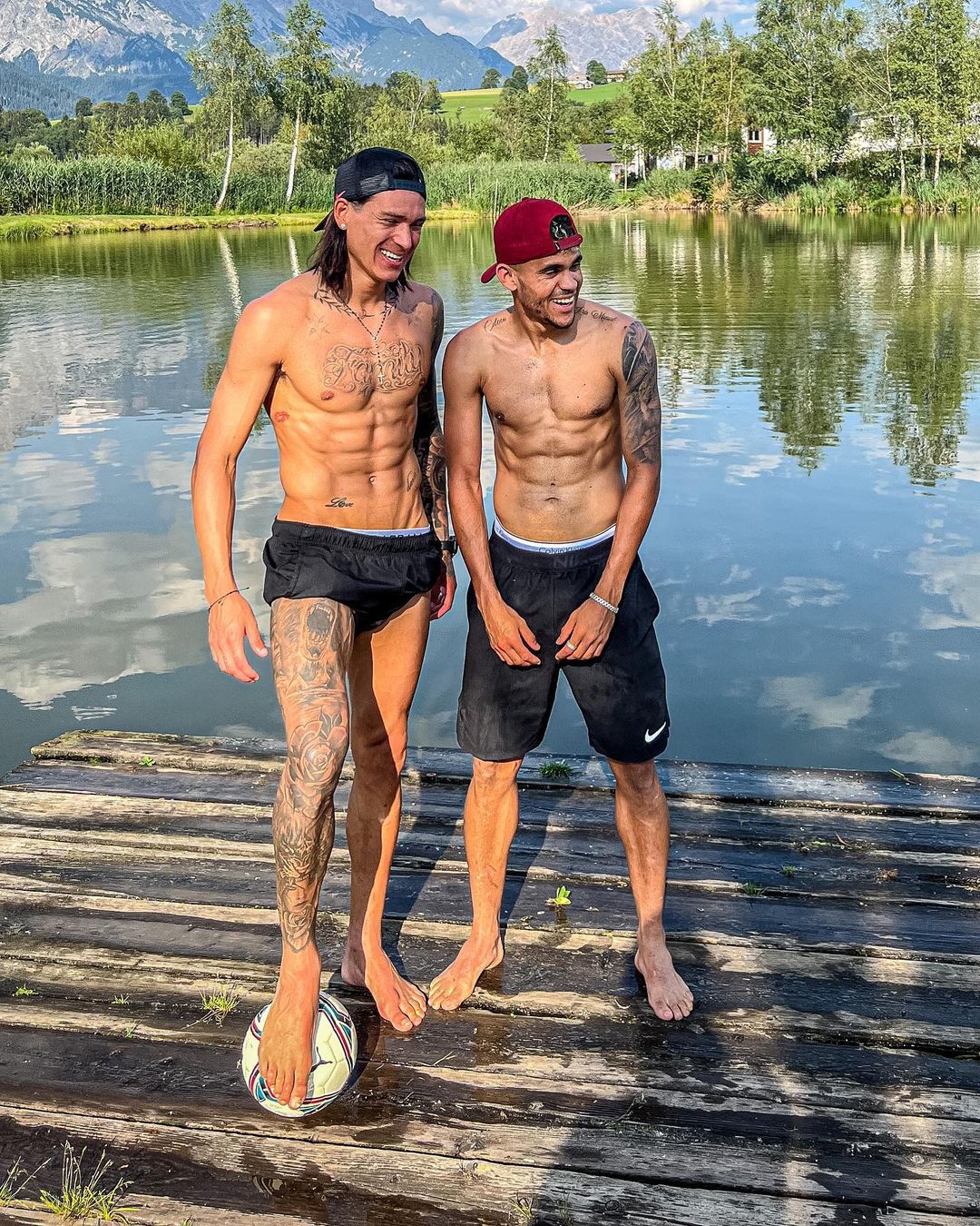 Nunez and Diaz posed with a football next to the fishing lake in Austria