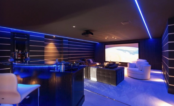 There is a home cinema to enjoy a film in